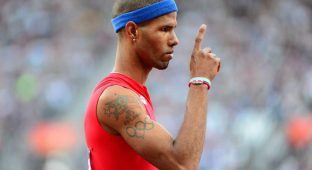 Olympic Symbol Tattoo On Javier Culson Right Shoulder
