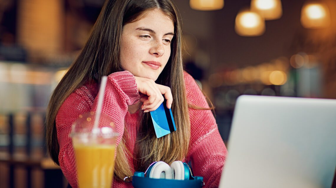 teenager using her credit card to shop online iStock 672752632