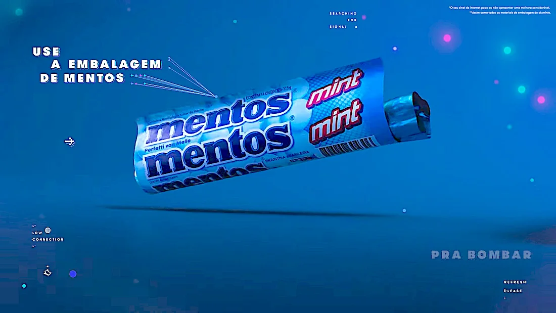 Mentos Mint candy roll packaging with dynamic movement effect against blue background.