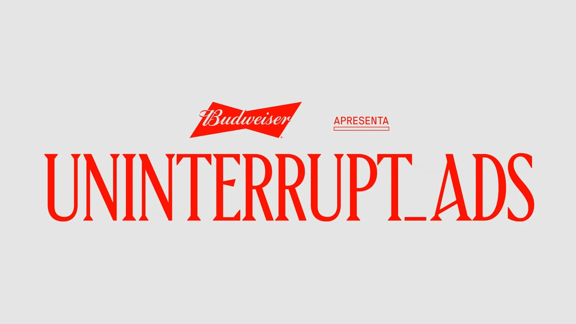 Budweiser presents Uninterrupted Ads campaign logo on a gray background