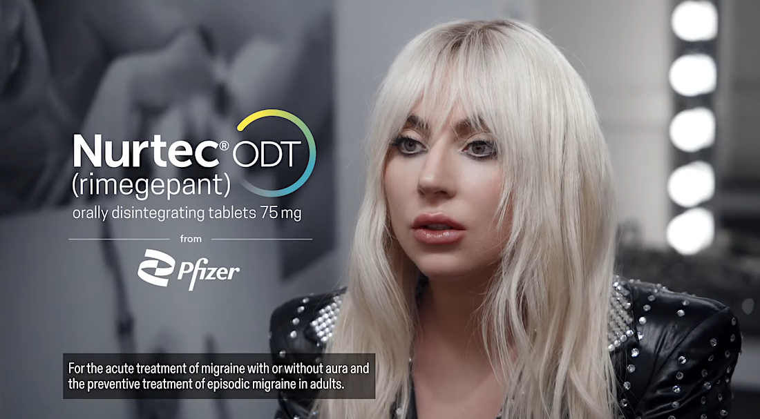 Woman discussing Nurtec ODT for migraine treatment by Pfizer with logo and product information in foreground.