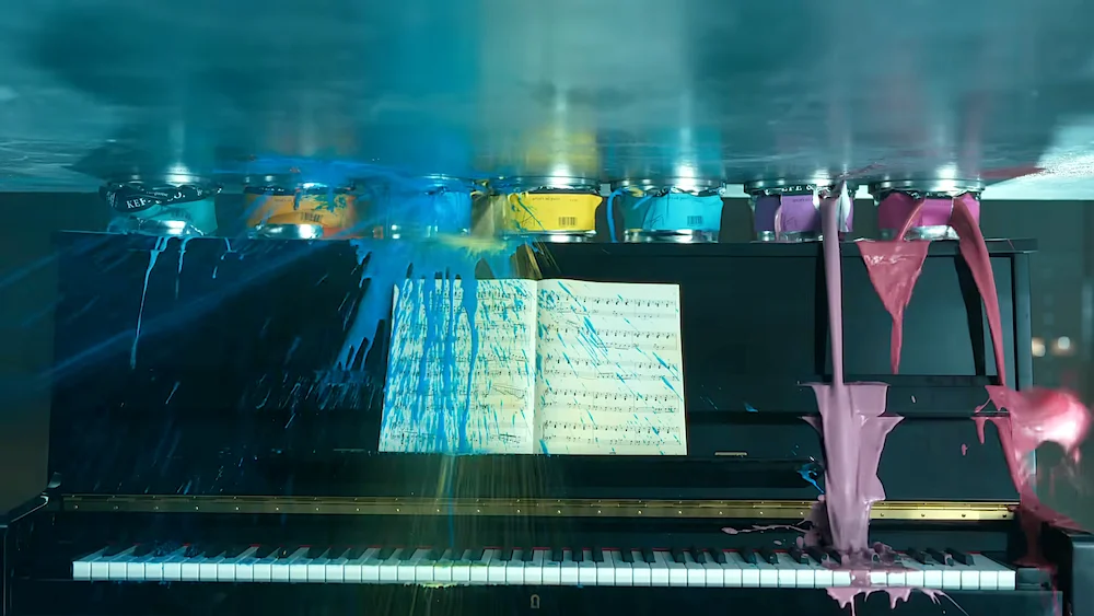 Crush! Apple. Artistic grand piano with colorful paint splashes and sheet music on stand, representing music and art fusion.