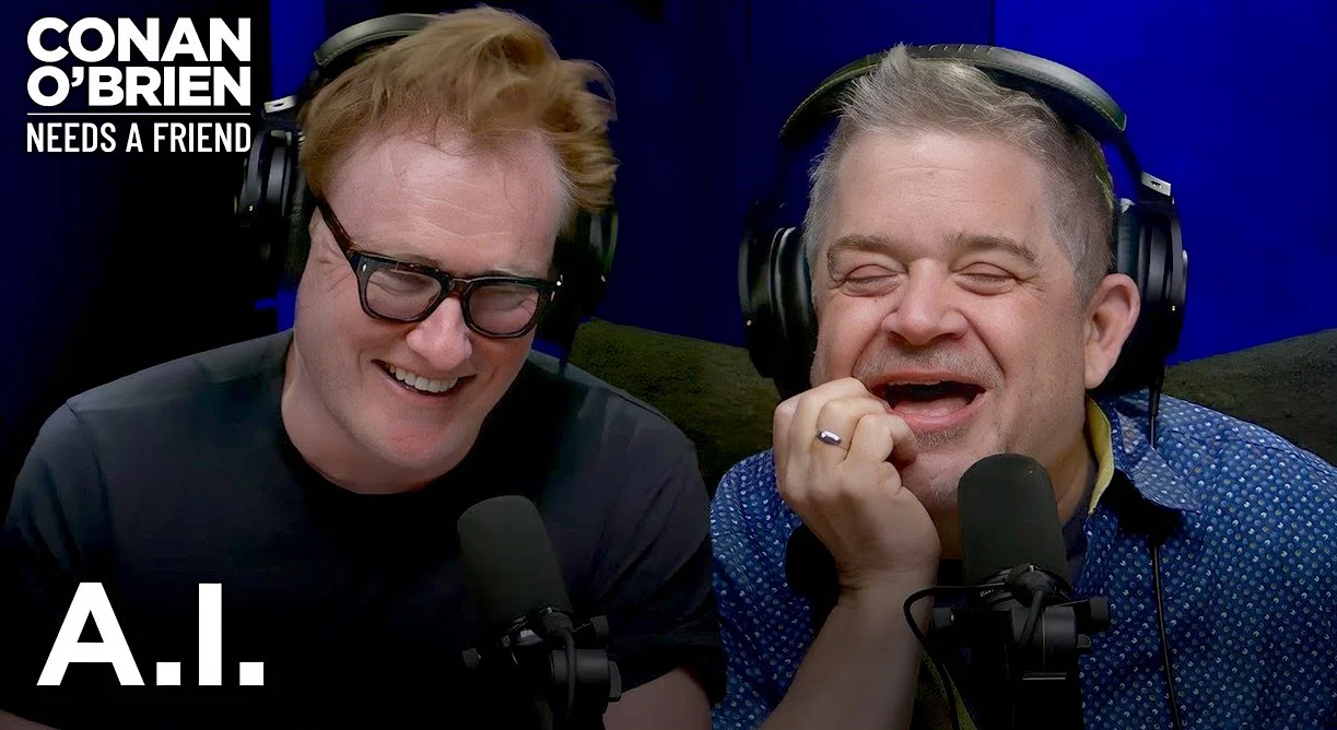 Two men laughing during a podcast recording with headphones and microphones, text overlay reads "A.I." and "Conan O'Brien Needs a Friend".