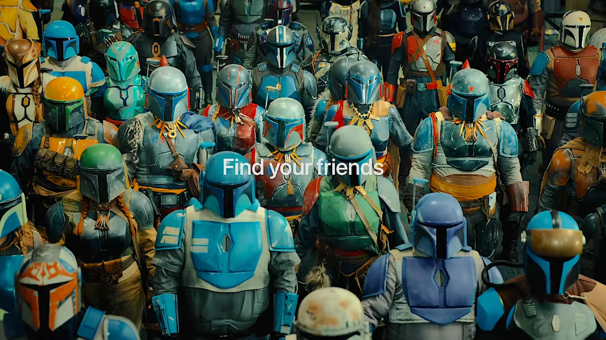 Group of people dressed as sci-fi armored characters with various helmet designs and the text "Find your friends" overlayed
